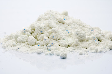 Powder detergent isolated on white.