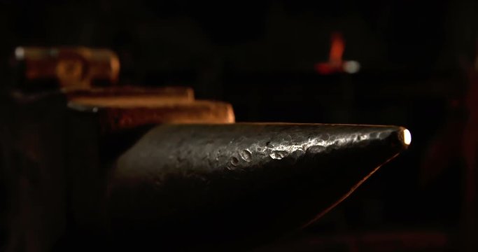 Close-up of anvil and hammer in workshop 4k