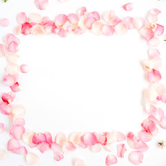 Obraz na płótnie Canvas Frame made of pink roses petals on white background. Flat lay, top view. Valentine's background