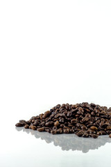 Coffee beans isolated and reflected with white background