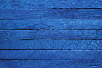 Blue wooden background.