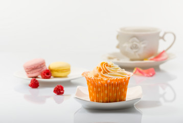 Cupcake on background tea set