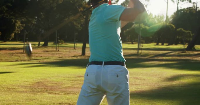 Golfer playing golf at golf course 4k
