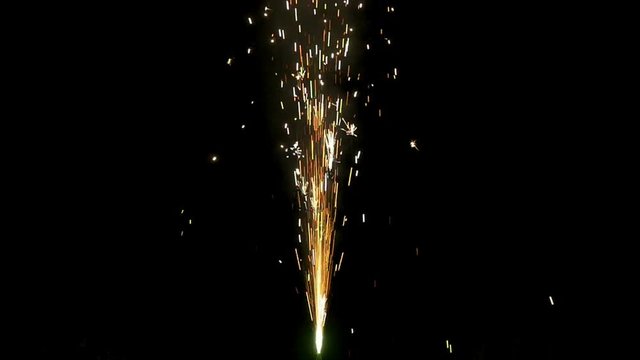 Sparkle fountain end isolated on a black background in slow motion
