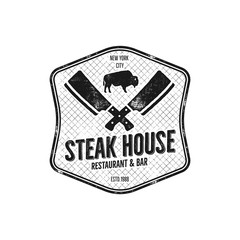 Steak House vintage Label. Typography letterpress design. Vector steak house retro logo. Included bbq grill symbols for customizing steak house badge. Monochrome insignia isolated on white background.