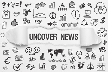 Uncover News / weißes Papier mit Symbole