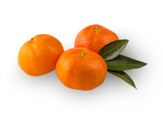Ripe mandarin with leaves close-up on a white background