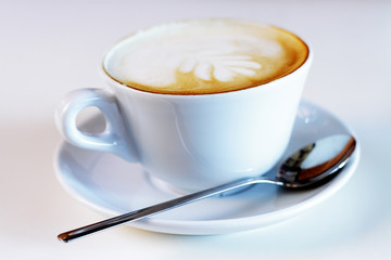 cup of coffee with milk and cream