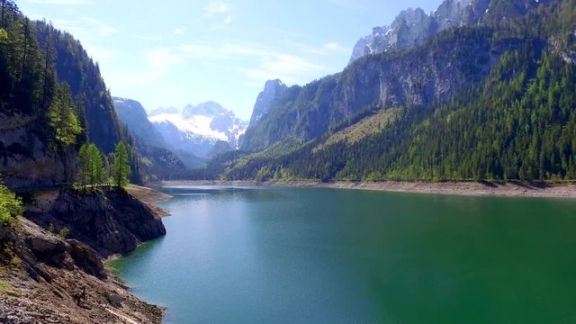 Sunrise over the mountain lake in Gosau in Austria, Alps