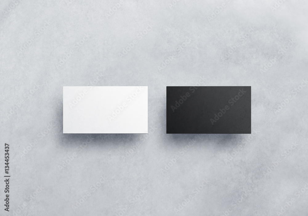 Fototapete two blank business card mockups isolated on grey textured background. black and white namecard desig