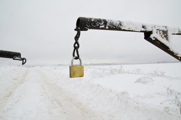 winter landscape with chain and padlock