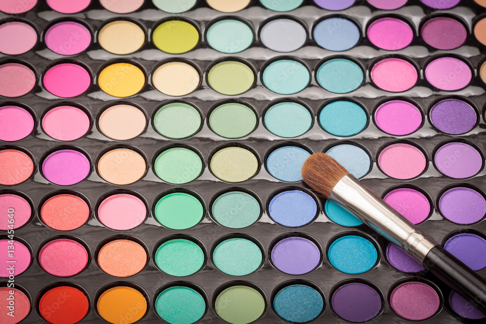 Wall mural beauty background with makeup brush and palette