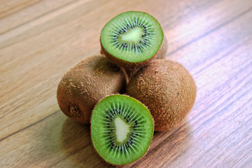 Closeup of kiwi on a wooden table