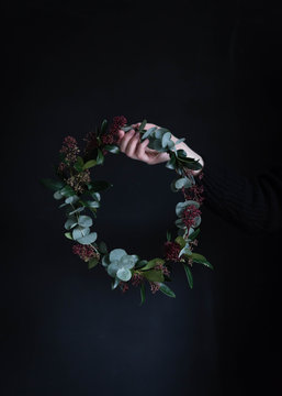 holding a wreath in my hands