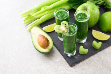 Blended green smoothie with ingredients. Superfood, detox 