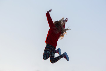 Silhouettes of girl jumping , Jumping 
