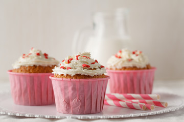 Muffins with heart decorations