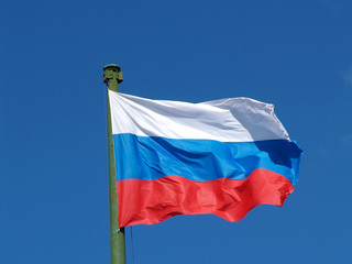 Flag of Russia against the blue sky