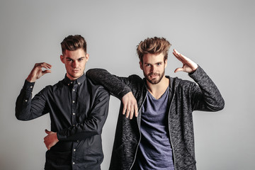 Obraz premium handsome smiling sexy stylish men