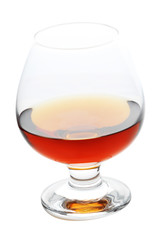 Glass of cognac isolated on white background