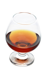 Glass of cognac isolated on white background