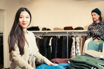 Couple Shopping For Clothes