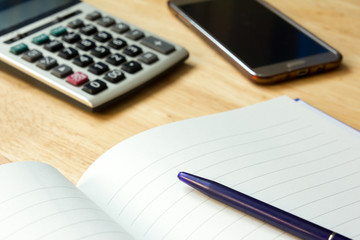 Note book with pen,calculator, smart phone