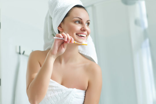 Woman Brushing Her Teeth 