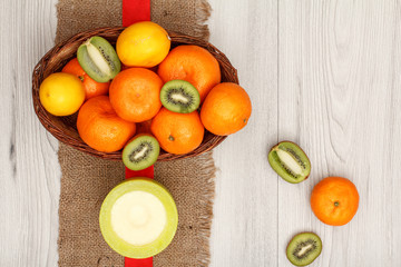 Wicker basket with tropical fruits