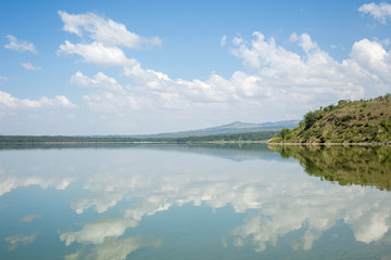Blue sky reflected in waters of Elmenteita Lake, Kenya
