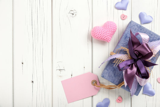 Valentine's day background with hearts and gift box