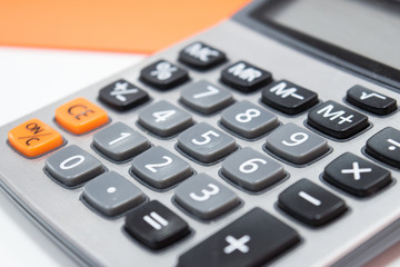 close up business design calculator in work office