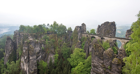 Fototapeta na wymiar Bridge between rocks near Rathen, Germany, Europe (Sachsische Sc