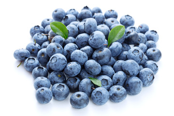 Heap of blueberries isolated on white background