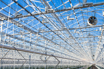 Empty greenhouse. Electric ventilators