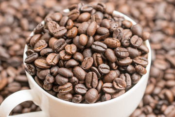 Coffee beans and coffee cup