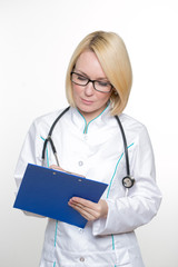 Smiling medical doctor woman with stethoscope. Isolated over white background