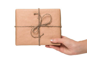  Small gift in the hands of a woman