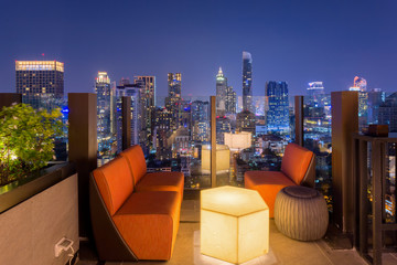 Bangkok city view point from rooftop of building, blue sky and city light, Bangkok is the most...