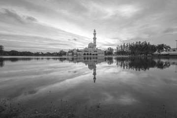 Tengku Tengah Zaharah Floating Mosque in Kuala Terengganu, Malaysia at sunset