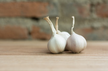 Fresh garlic on vintage background
