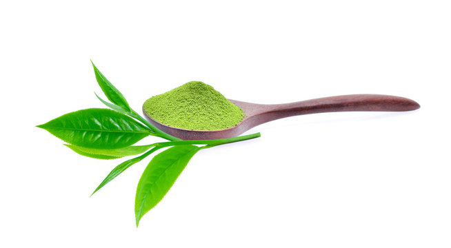 Powder green tea and green tea leaf on white background