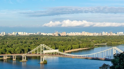 Kiev City, landscape, view of the bridge from above. Beautiful views of the Dnipro River, Texture clouds and foliage.