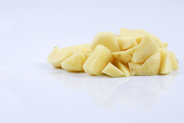 Fresh raw potato on white background.