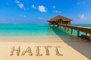 Word Haiti on beach