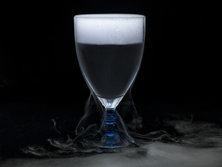 Wine glass fill water with smoke