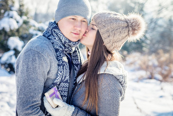 Girl kisses her boyfriend for present on Valentine's day