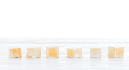 Eastern sweets Turkish delight on a white background closeup
