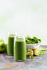 Green juice in tall glasses