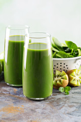 Green juice in tall glasses